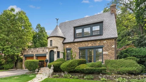 29 New Windows and a Patio Door Transform a 1937 French Provincial Home in Deerfield