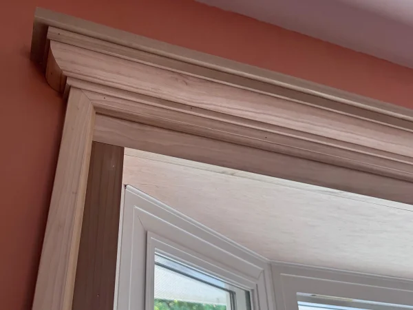 Bay window interior original trim and crown molding rebuilt.